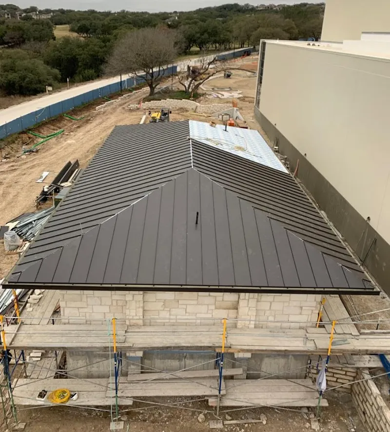 Metal roof new construction with scaffolding in Canton