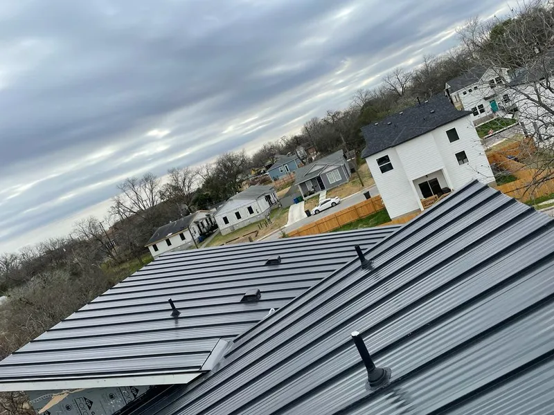 Standing seam metal roof panels with vents for Skylight Repair in Canton